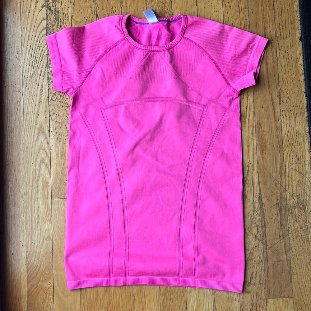 Hot pink.  No rips/tears or stains.